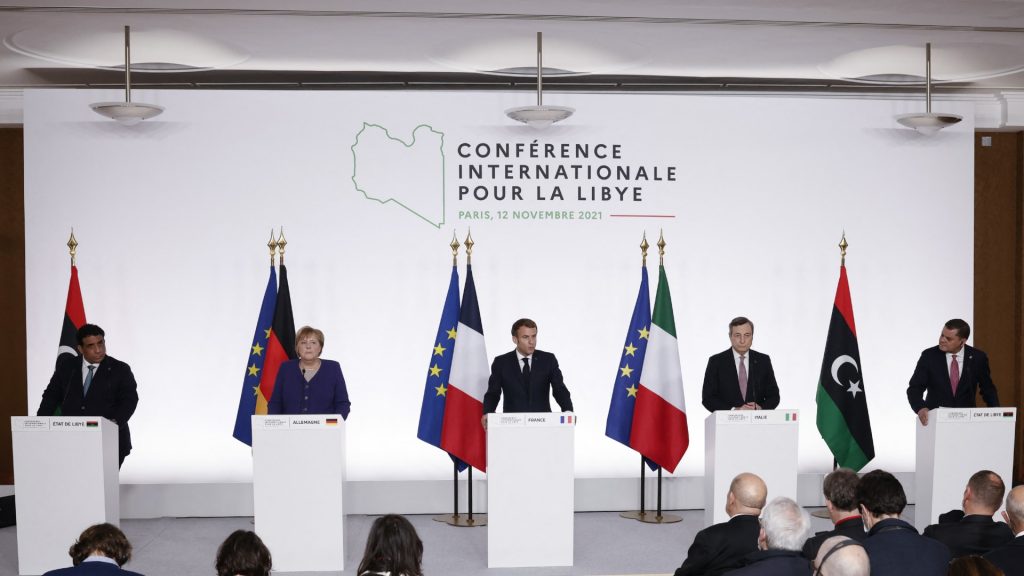 ليبيا:-مؤتمر-باريس-يدعو-لإجراء-الانتخابات-وخروج-المرتزقة.-والدبيبة-يطلب-تعديلا-قانونيًا