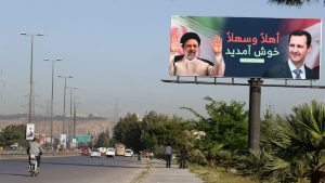 بهتافات-“يا-علي”.-مجموعة-تُرحب-برئيسي-في-دمشق-والخارجية-الإيرانية:-“استقبال-شعبي”