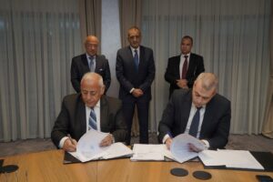 البنك الأهلي المصري يتعاون مع مجمع الإصدارات المؤمنة والذكية